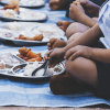 children eating in school